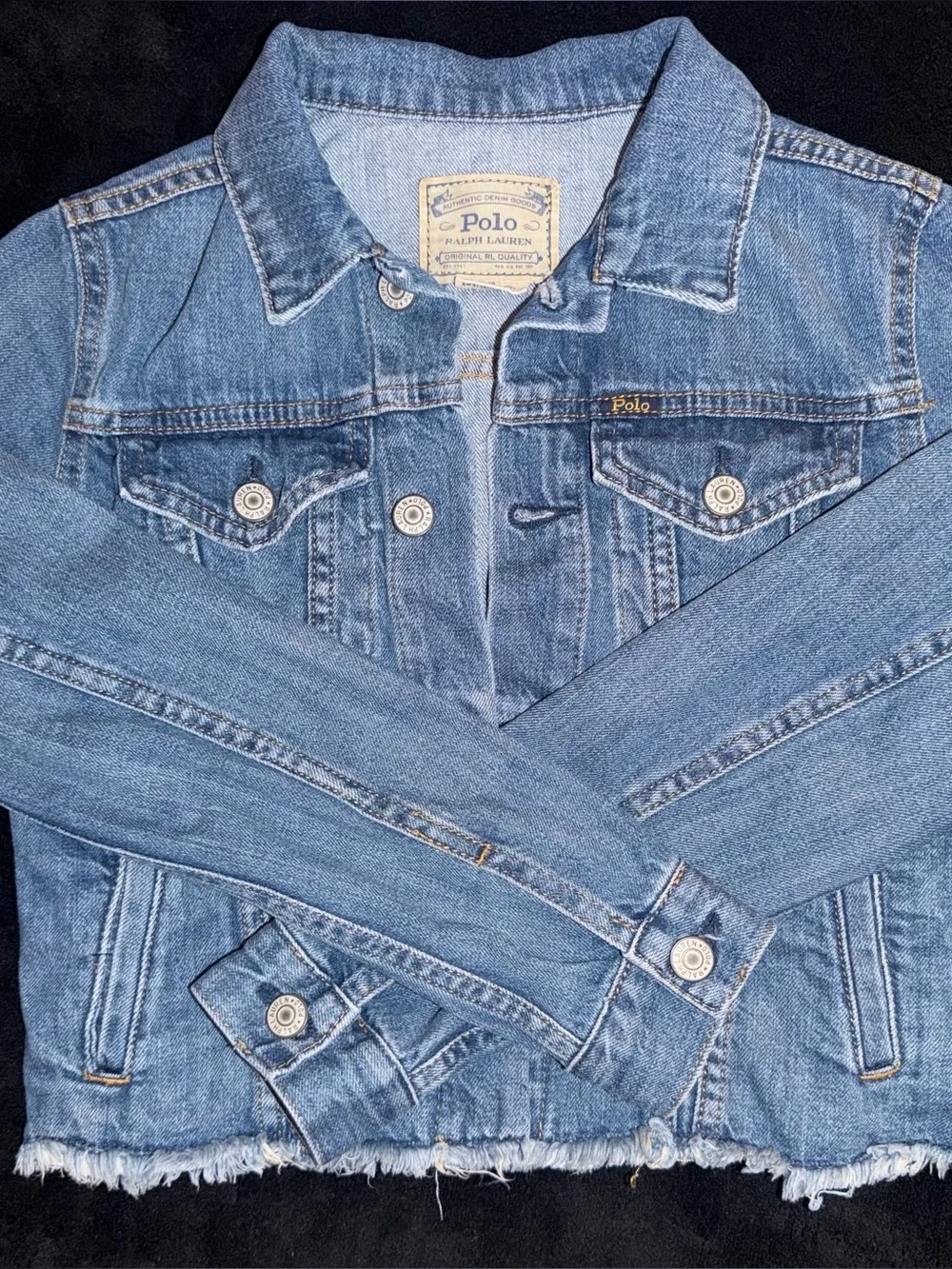 Ralph Lauren Polo Light Blue Denim distressed Jacket. Polo print on the back.